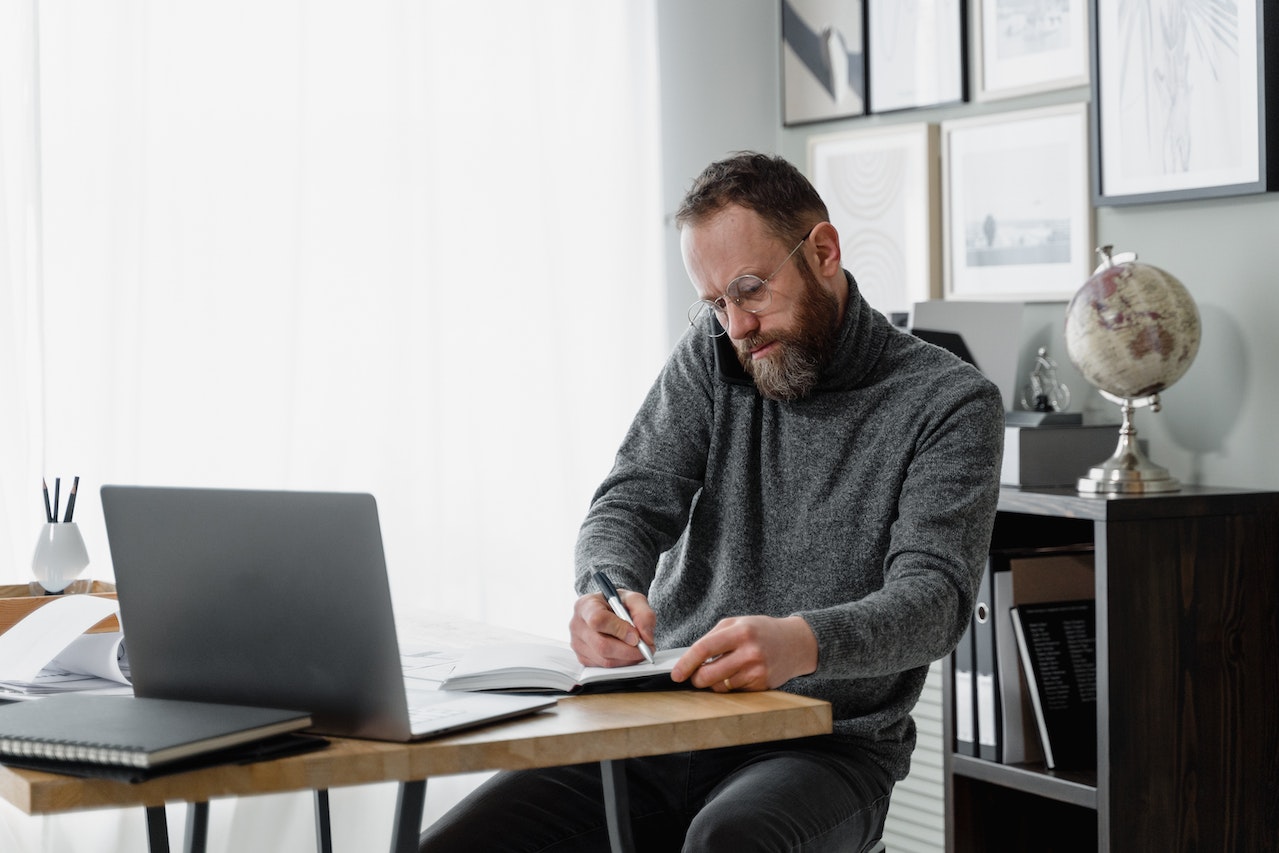 Man working on payroll